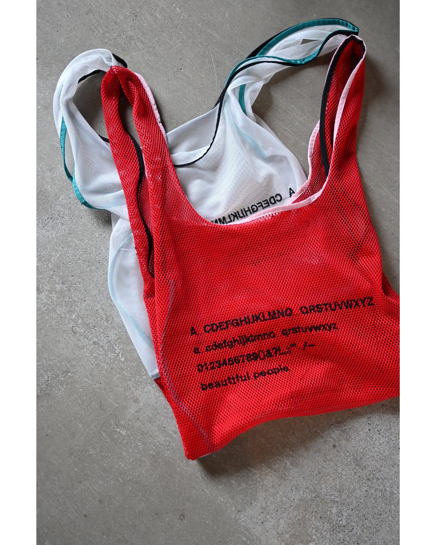 alphabet embroidely marche flip bag