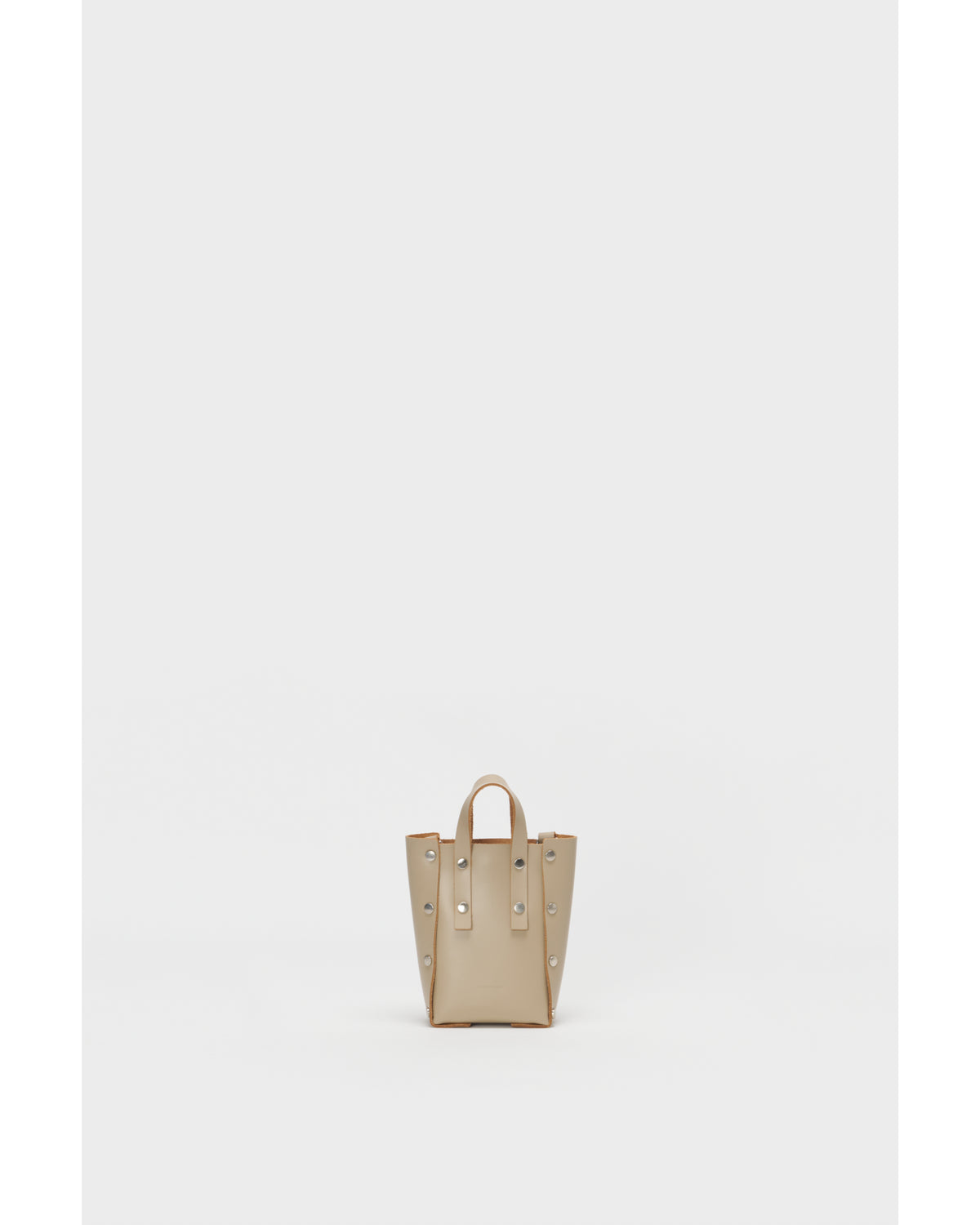 assemble hand bag tall XS beige