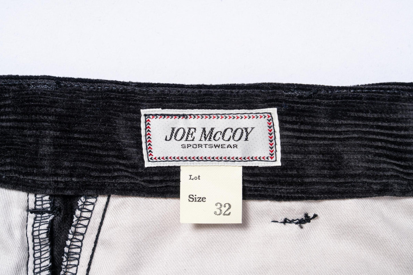 DOUBLE-PLEAT CORDUROY TROUSERS