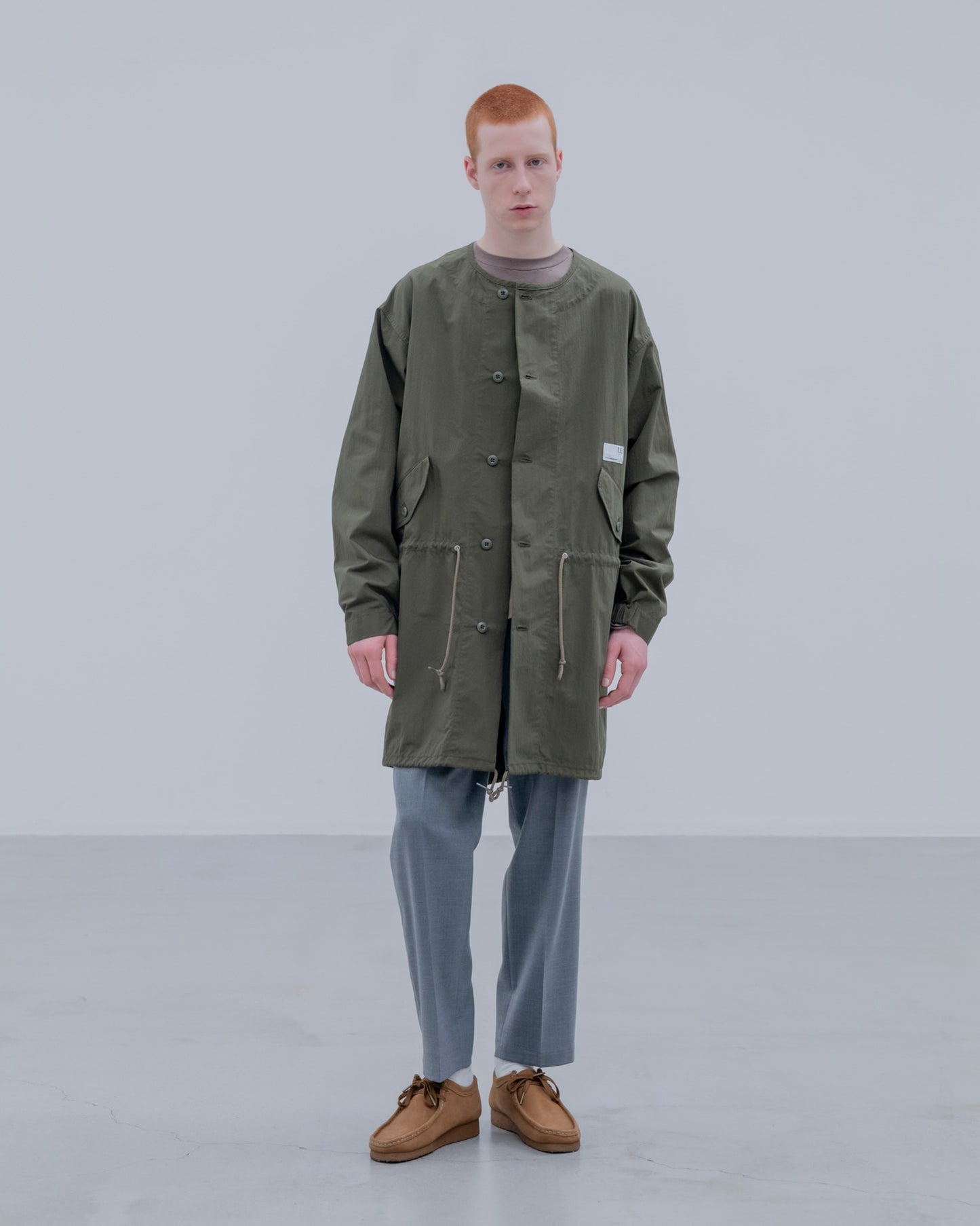 PROTECTIVE COAT
