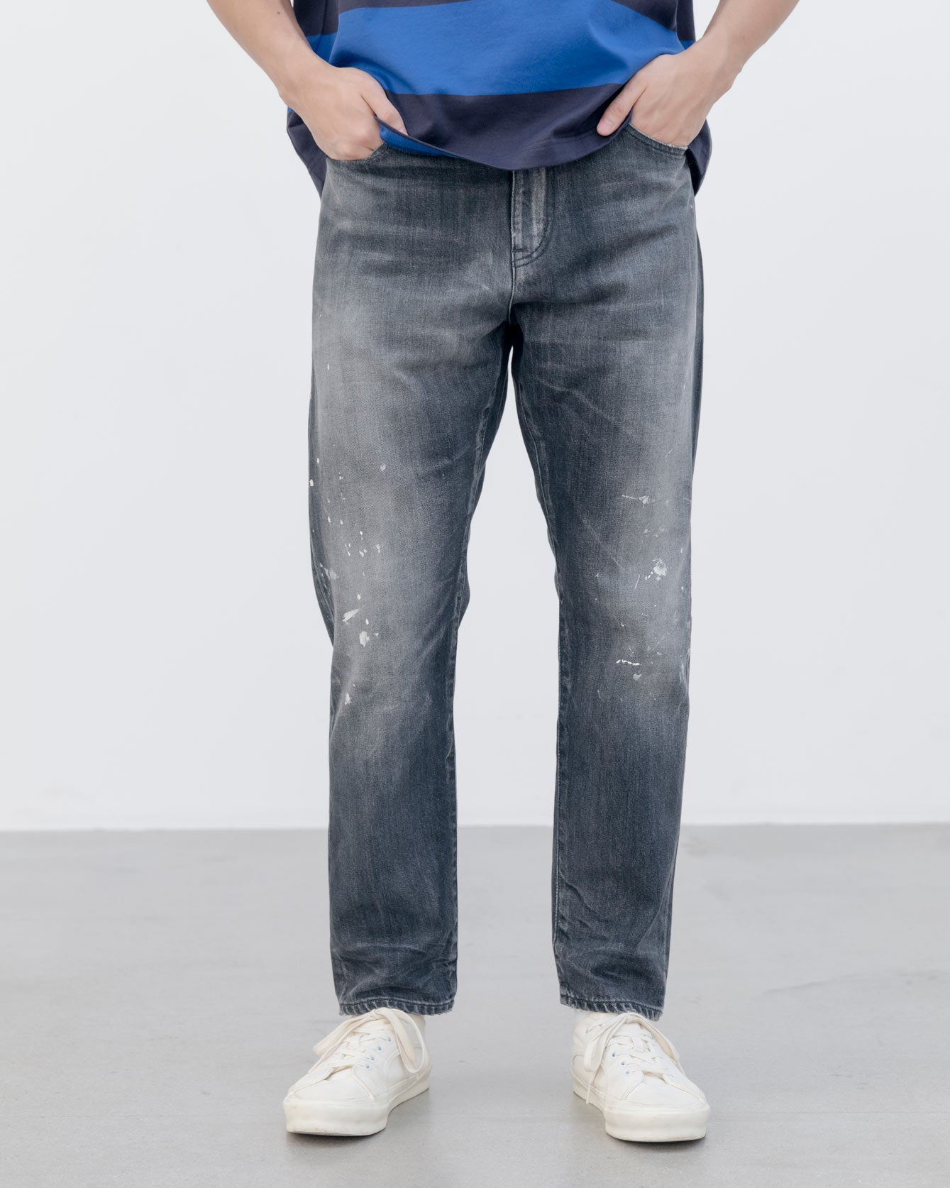 DAMAGED TAPERED-FIT JEANS