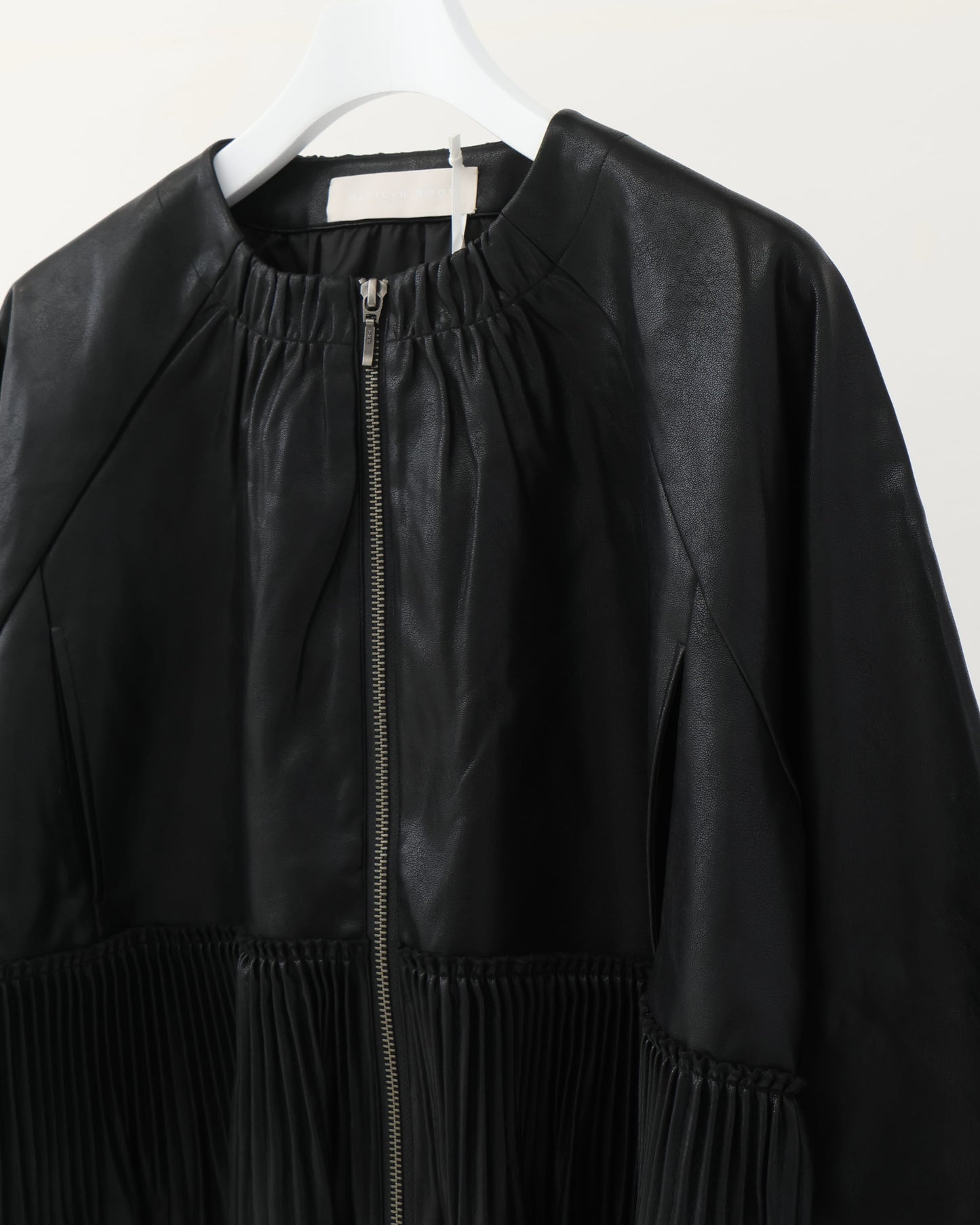 pleated fake leather blouson