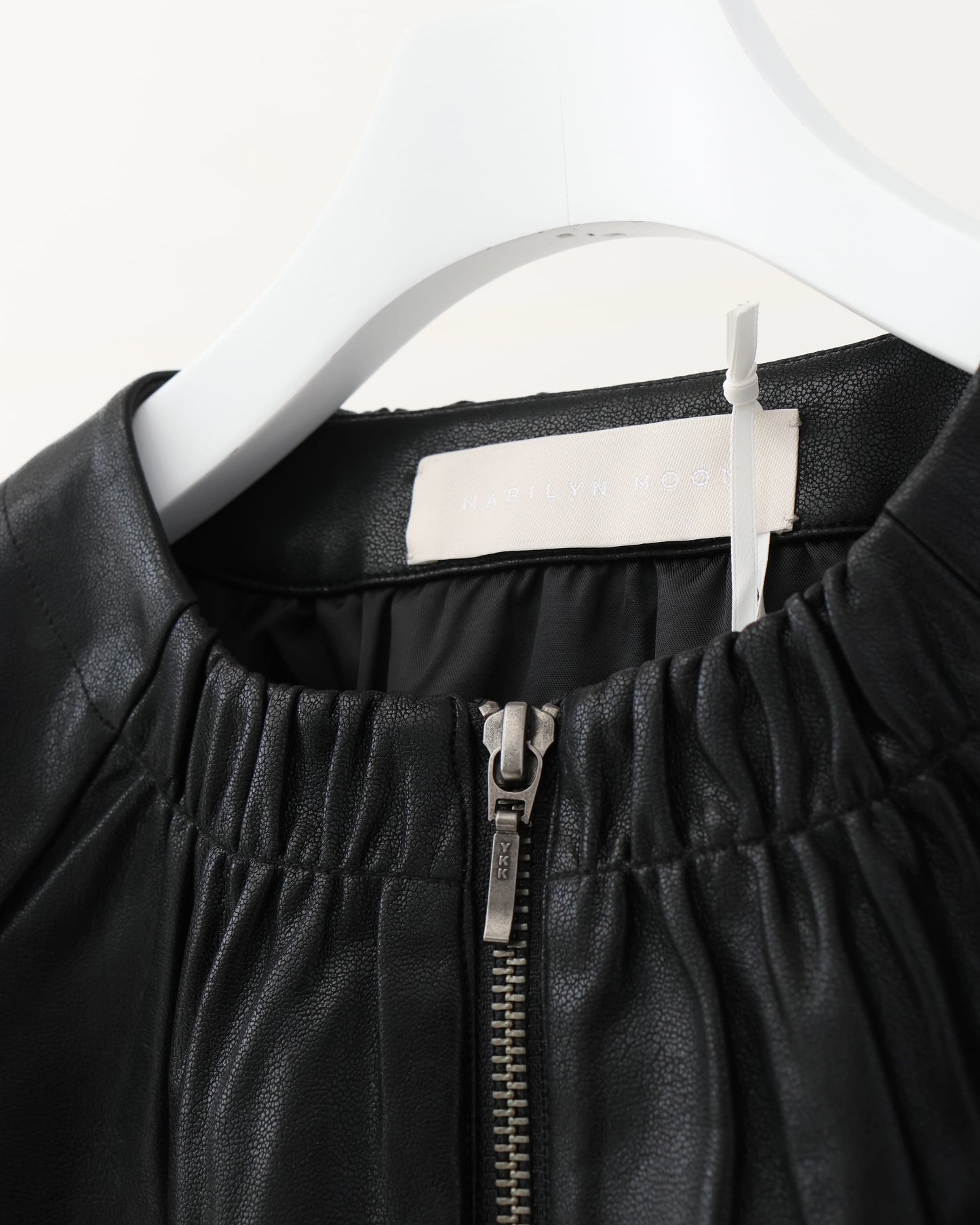 pleated fake leather blouson