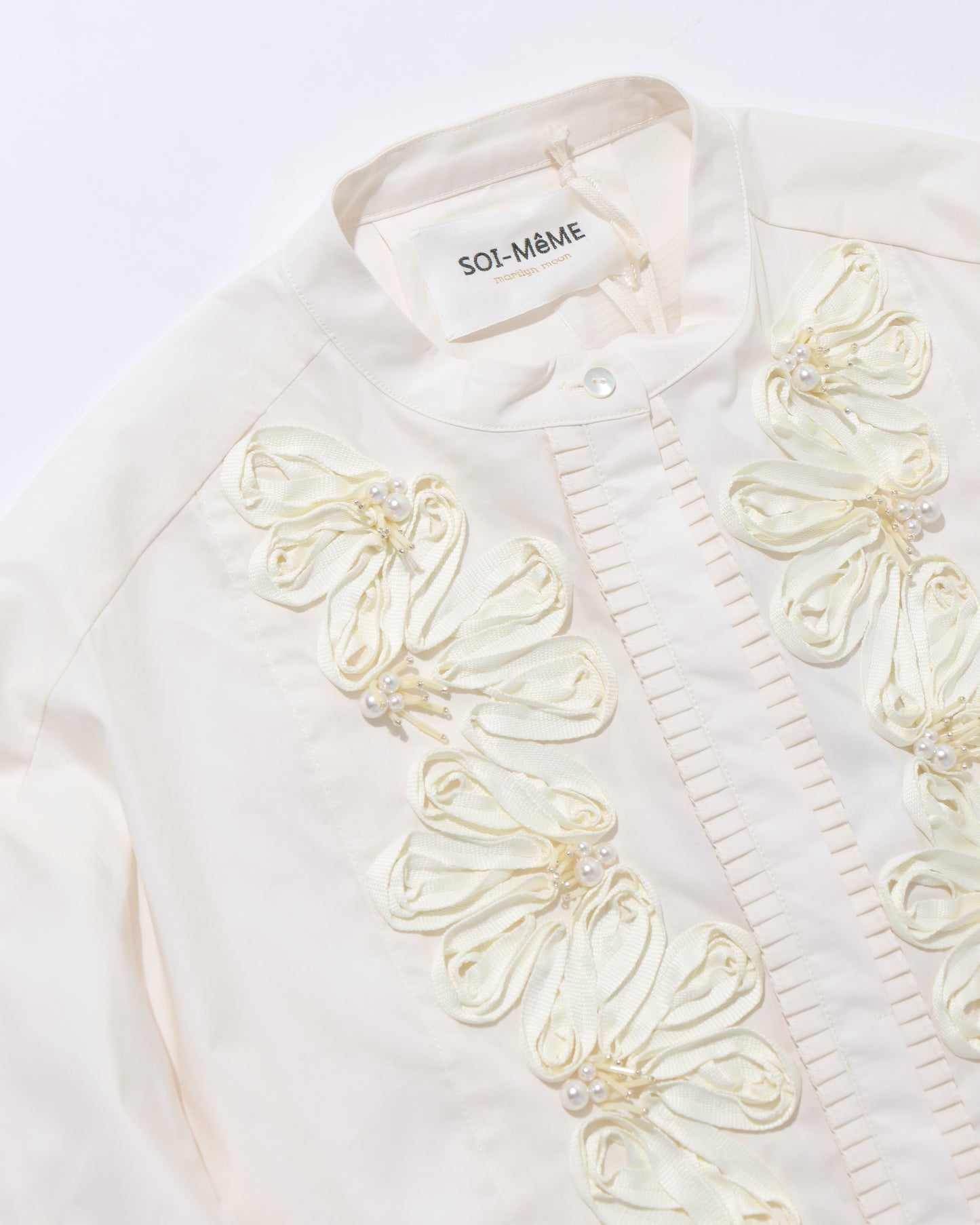 code embroidery pearl blouse