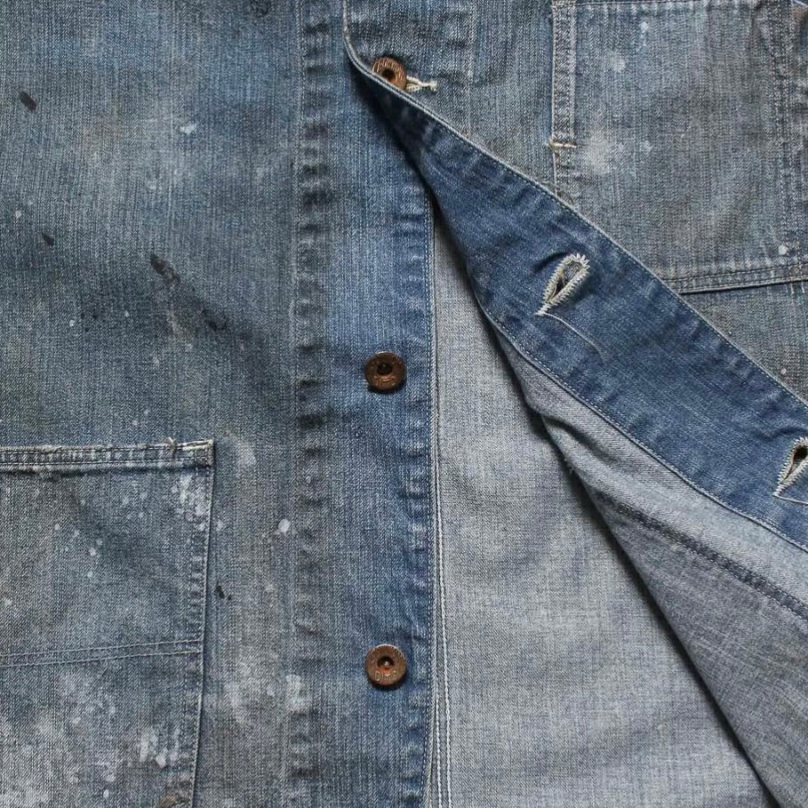 PAINT-STAINED ENGINEER'S COVERALL