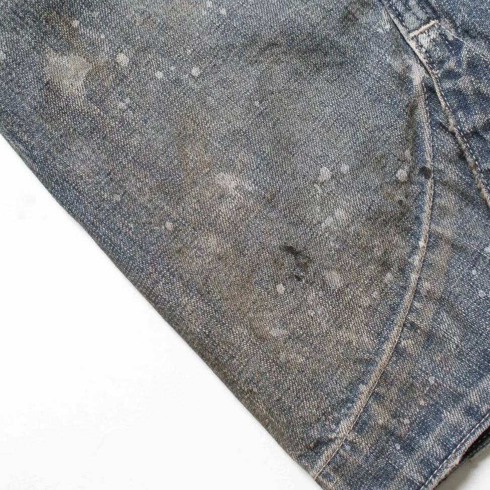 PAINT-STAINED ENGINEER'S COVERALL