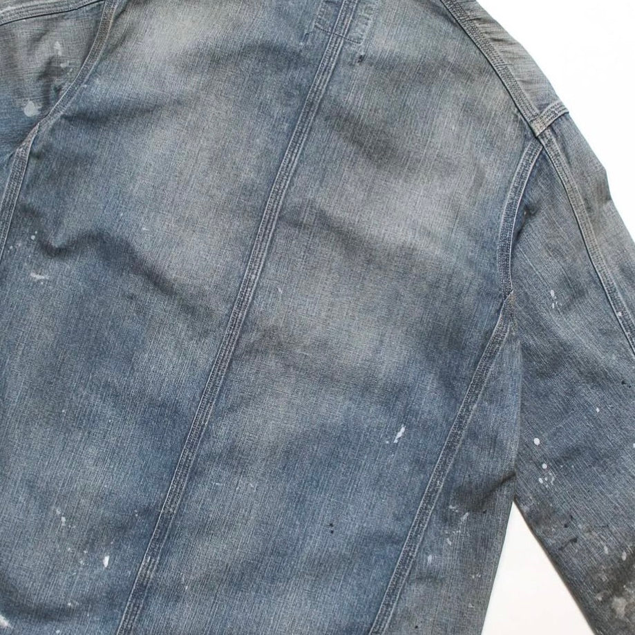 PAINT-STAINED ENGINEER'S COVERALL