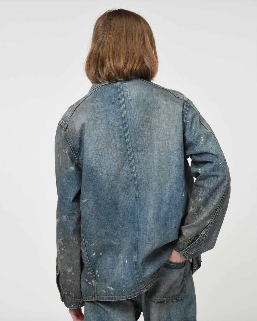 PAINT-STAINED ENGINEER'S COVERALL