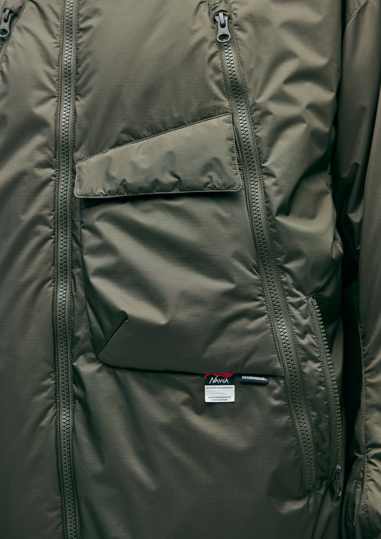 NH × NANGA . DOWN JACKET