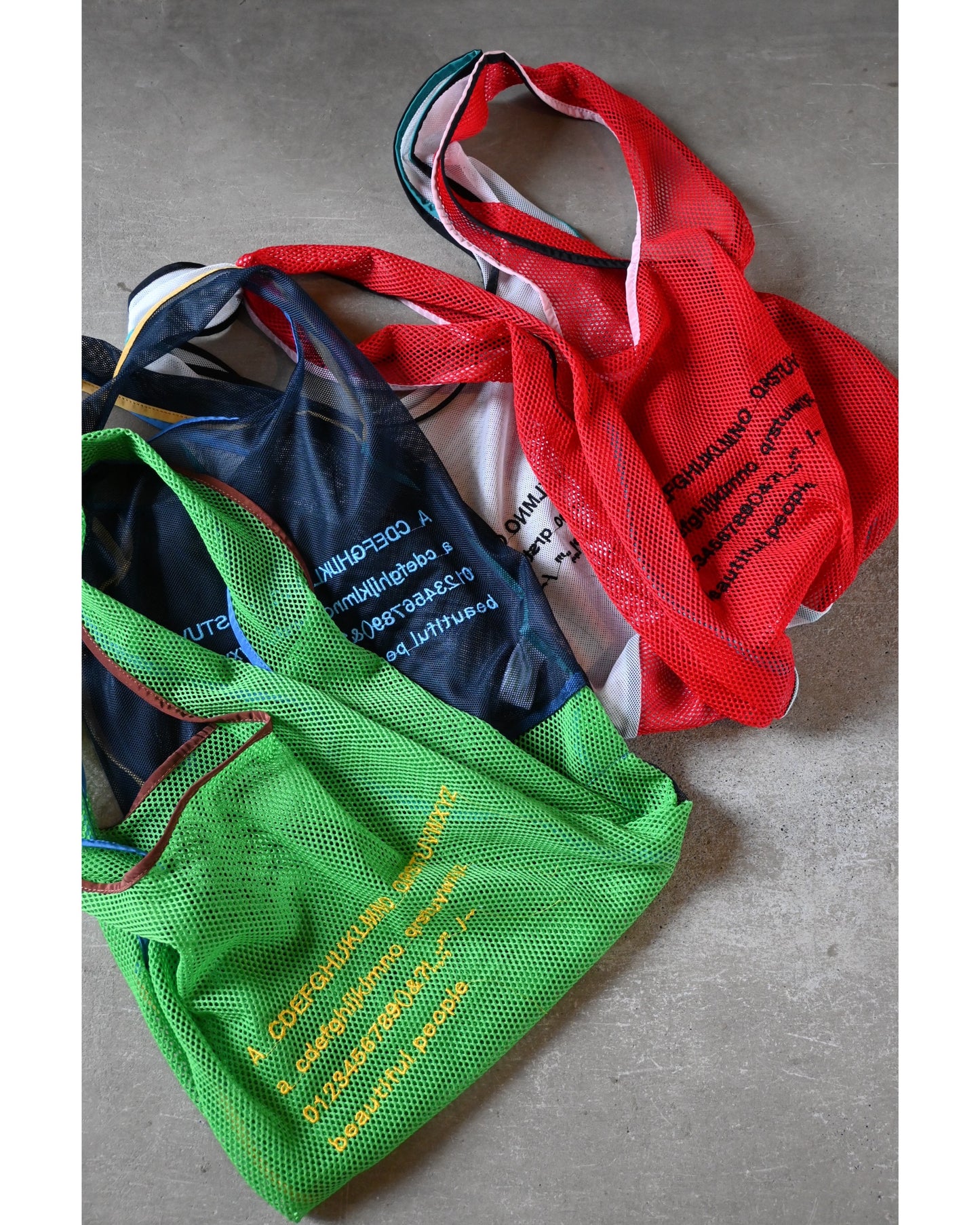 alphabet embroidely marche flip bag