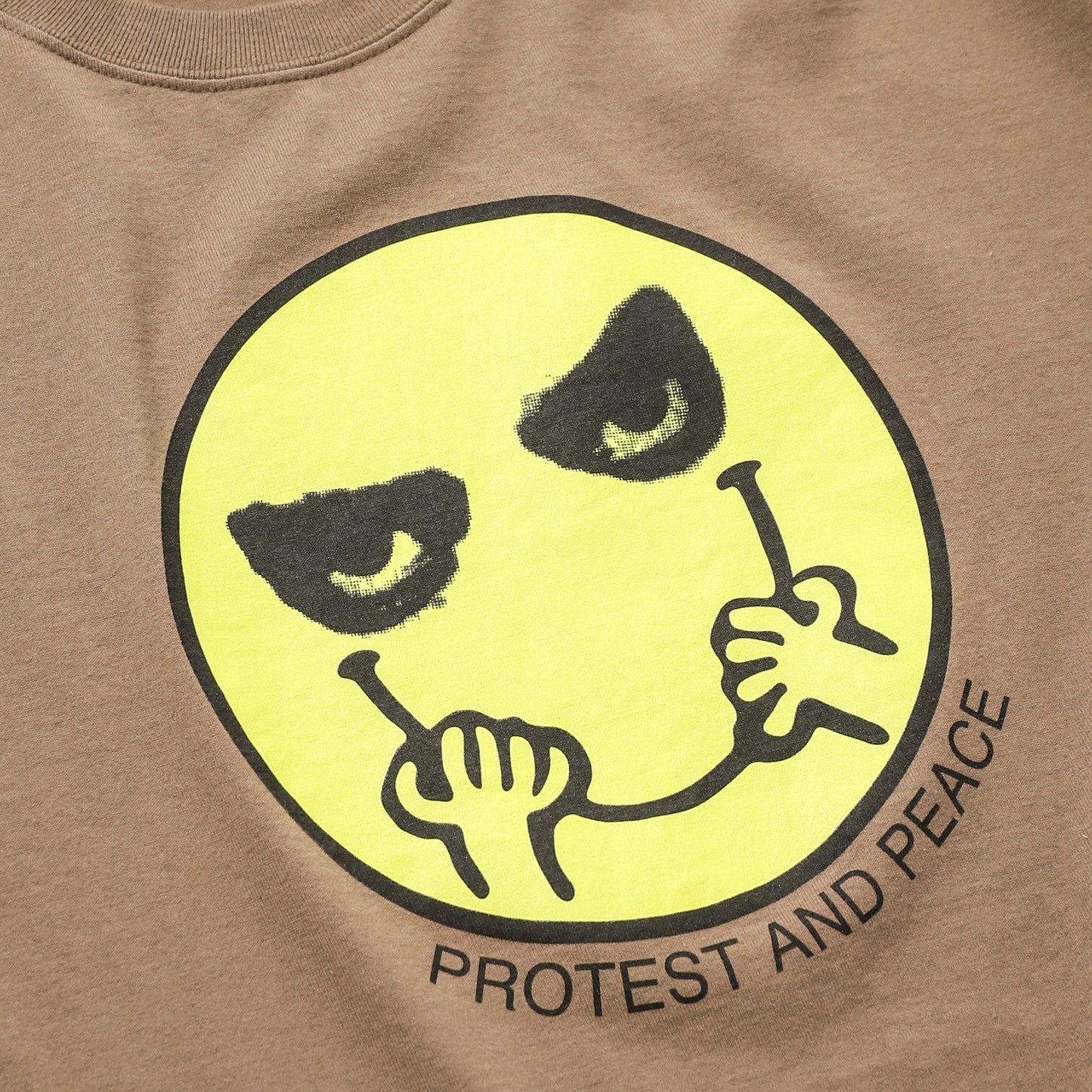TEE PROTEST AND PEACE