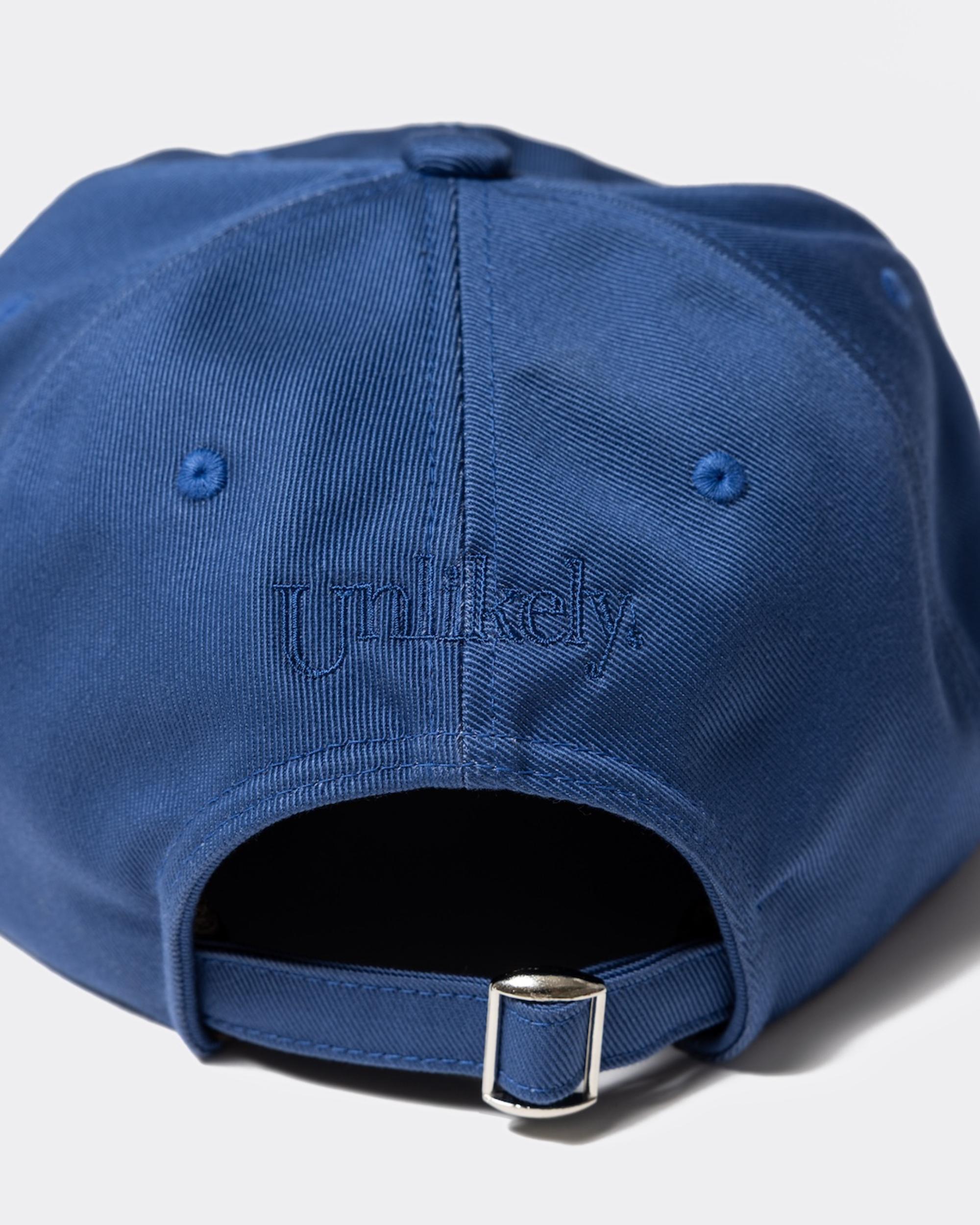 unlikely キャップ　ネイビー Unlikely Souvenir Cap 