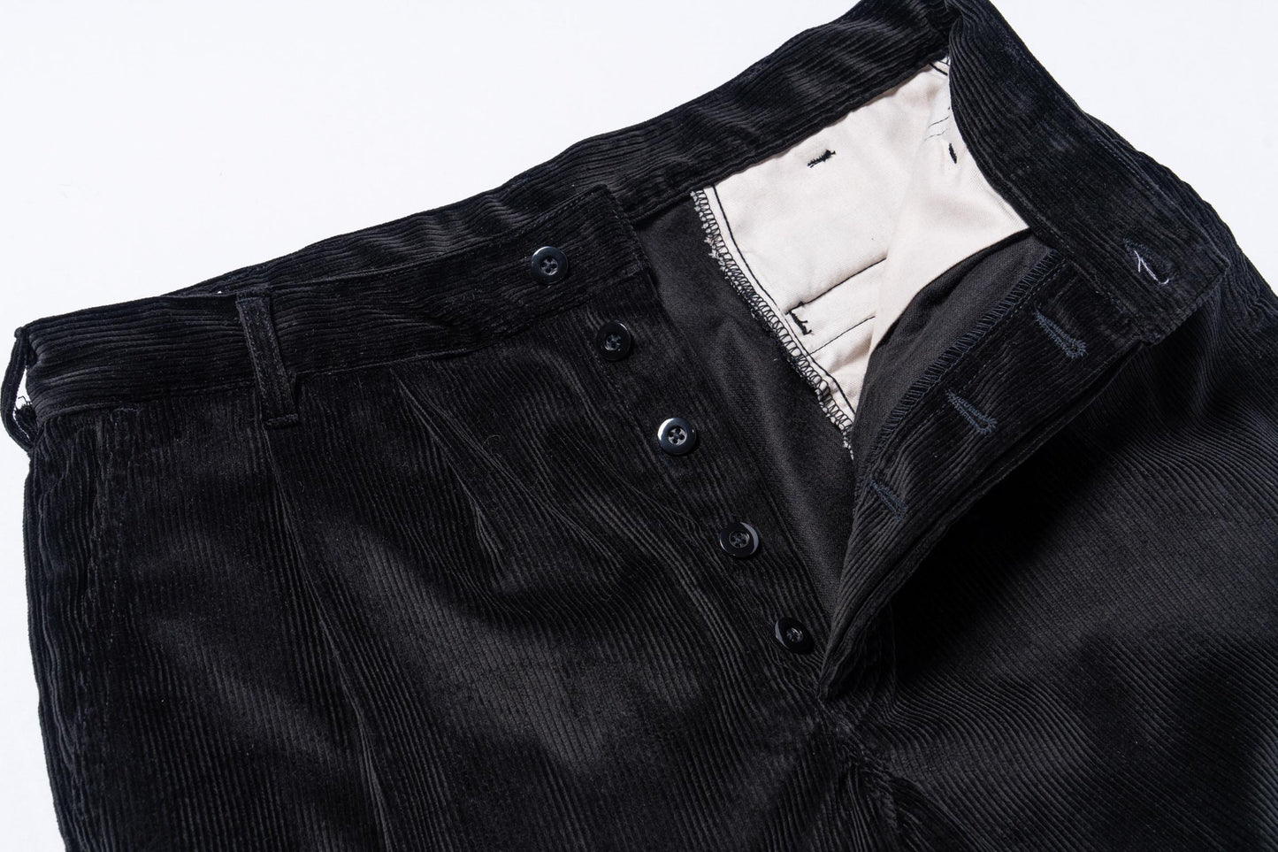 DOUBLE-PLEAT CORDUROY TROUSERS