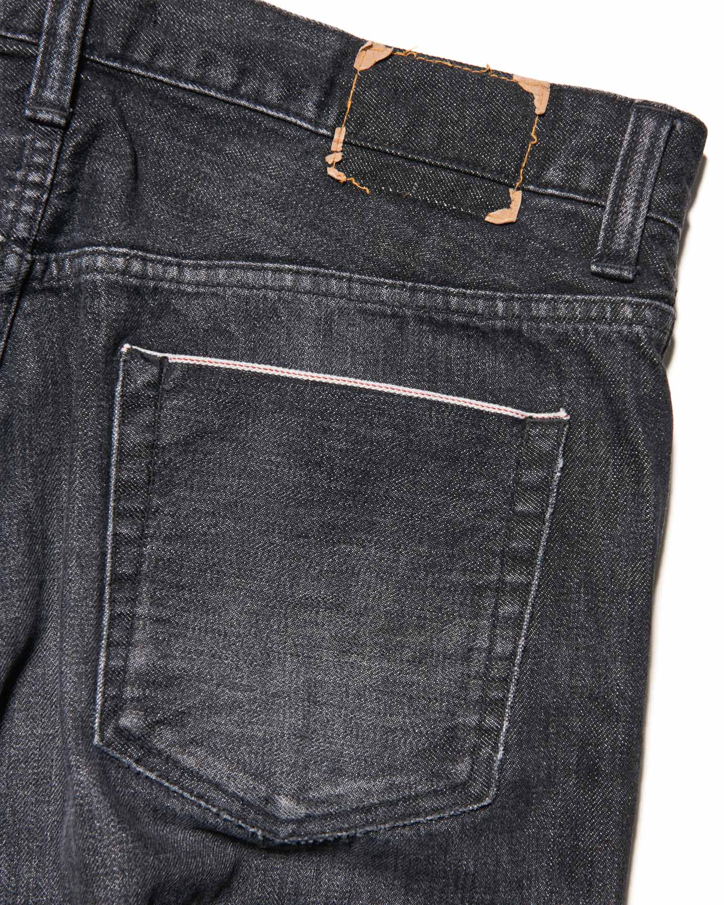 DAMAGED DENIM TAPERED-FIT JEANS
