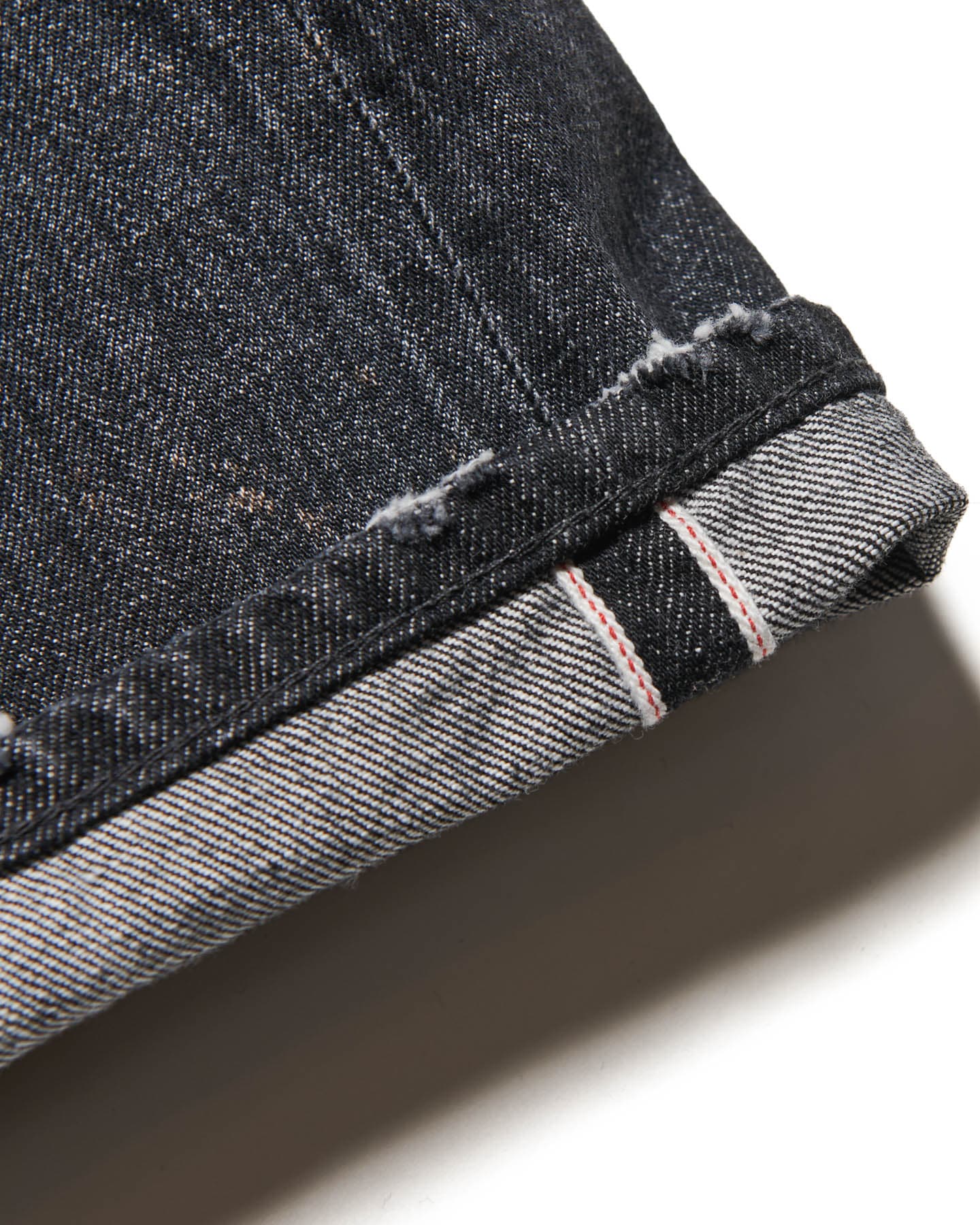 DAMAGED DENIM TAPERED-FIT JEANS