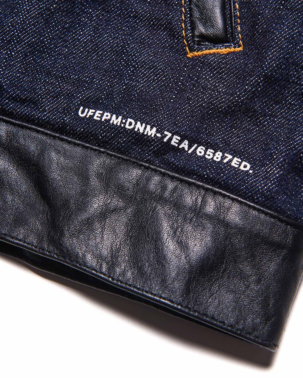 LEATHER ASSEMBLED DENIM TRUCKER JACKET